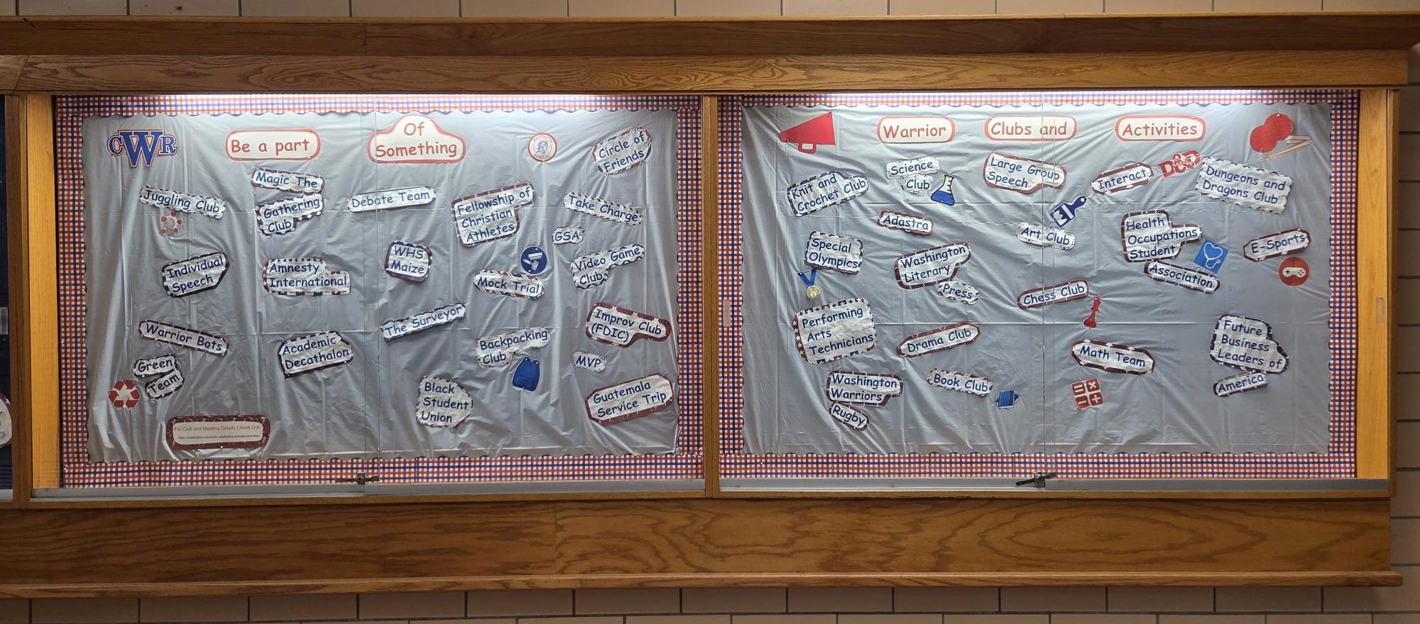 A bulletin board near the Washington courtyard displaying club and activity names.